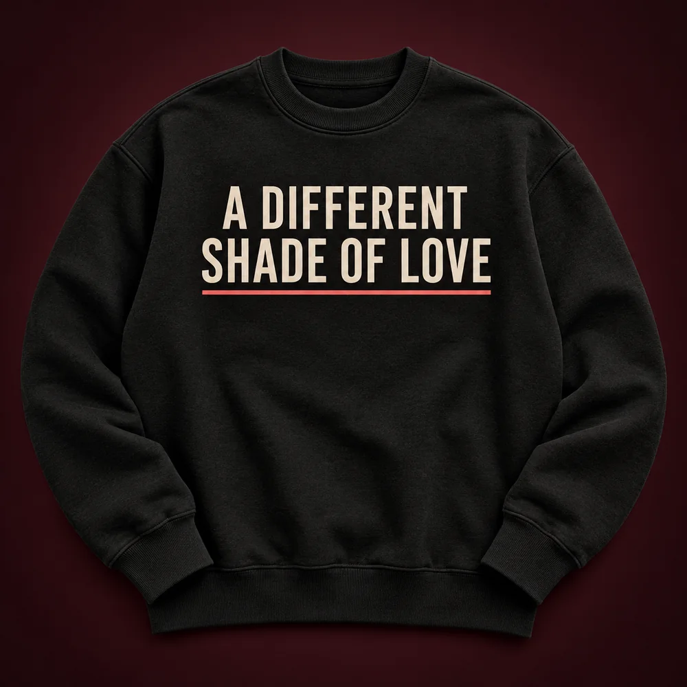 Black crewneck sweatshirt with A Different Shade Of Love wordmark across the chest.