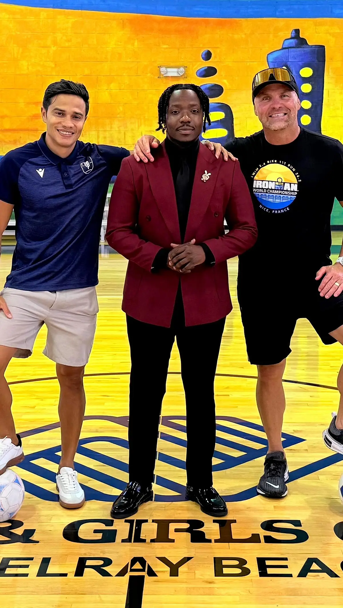 A program graphic showing three people standing on a court, with the Boys & Girls Club name across it.